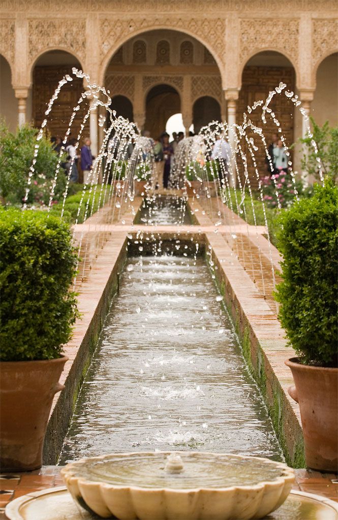 The Patio de la Acequia (Court of the Long Pond), with its 48m long pool lined with fountains, is one of the most popular parts of the Gardens Generalife in the Alhambra, Granada.