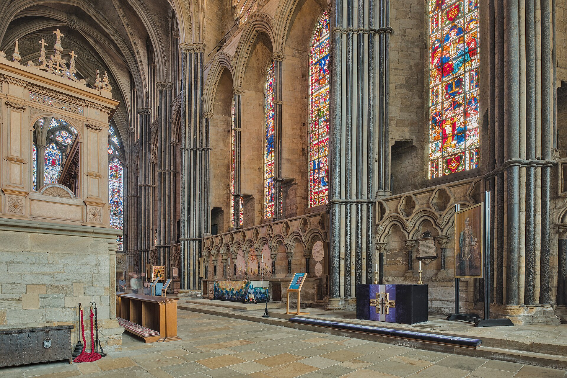 The Chapel of the Nine Altars at Durham Cathedral with tall lancets, clustered shafts, coloured glazing and individual devotional settings.