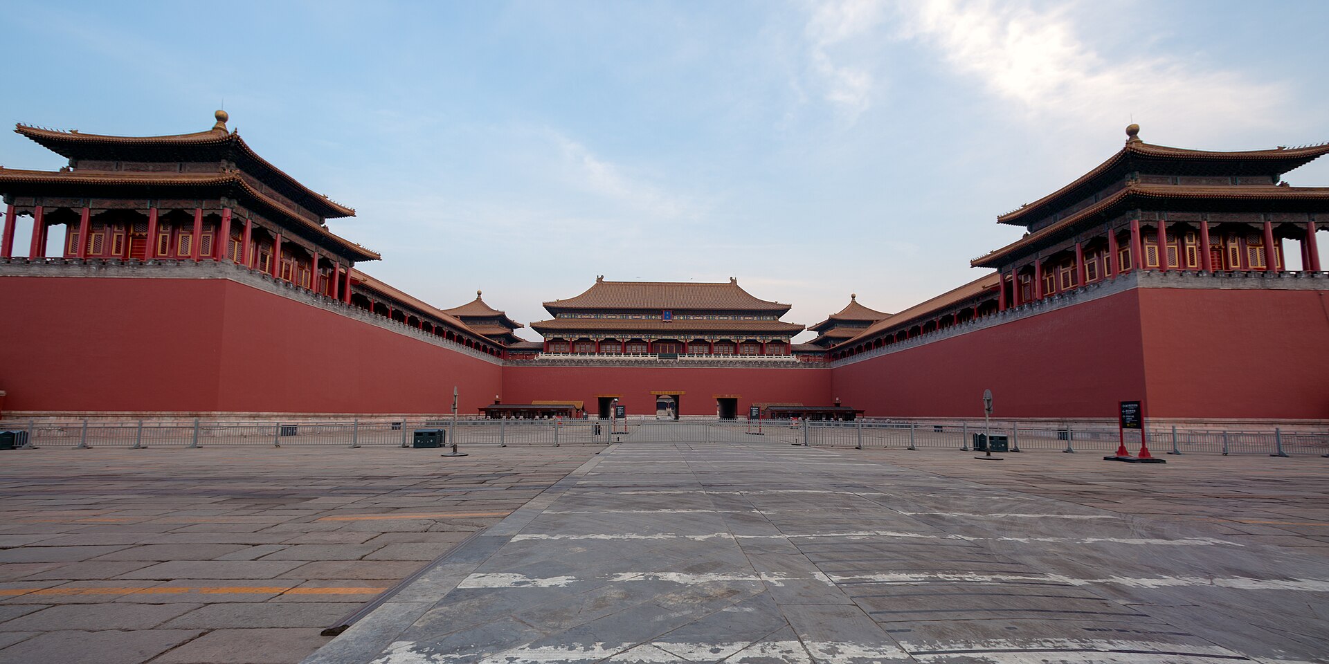 Front view of the Meridian Gate, with two projecting wings framing the central gate and broad paved approach.