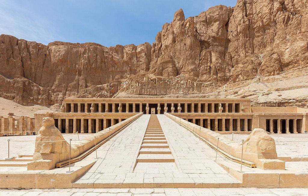 Rising central ramp and steps between colonnaded terraces beneath the cliffs at Hatshepsut’s temple.