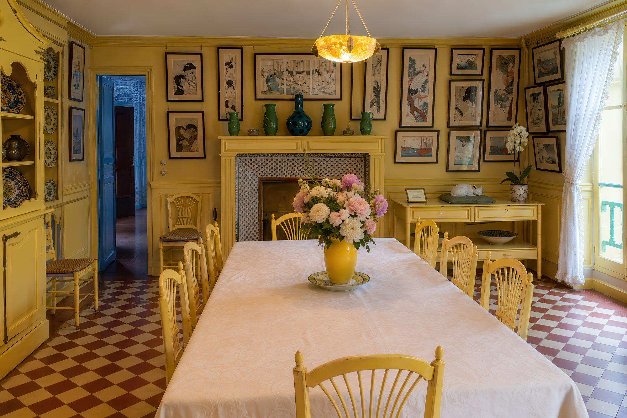 Monet's yellow dining room at Giverny displaying his Japanese print collection