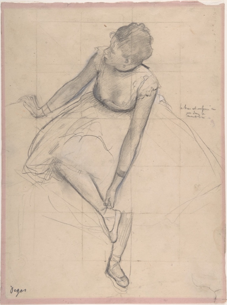 Seated dancer bends to adjust her slipper on squared pink paper
