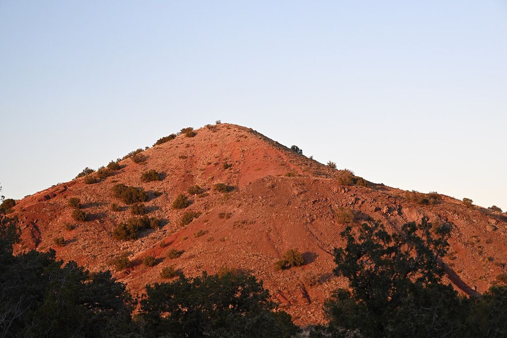 Photograph of Red Hill at sunset in Cibola National Forest.