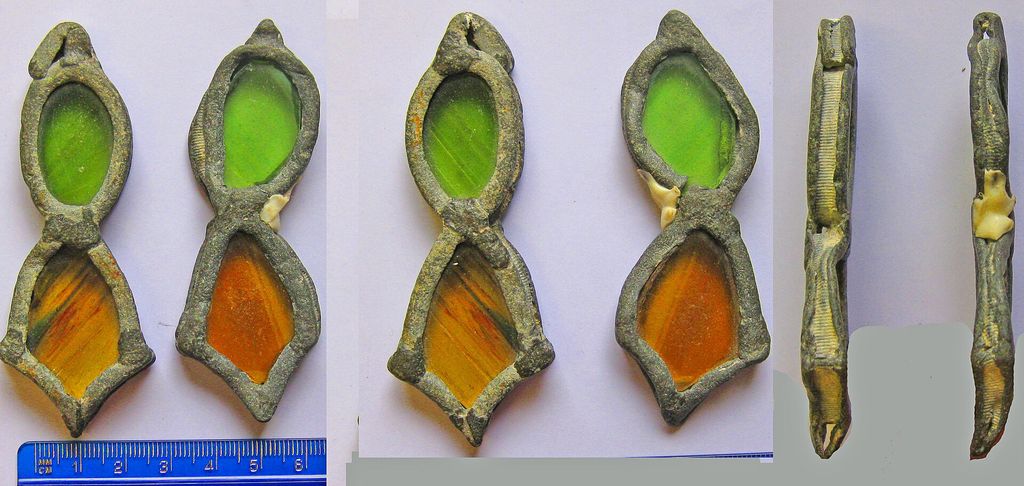 Contextual image of fragments of stained glass with surviving lead came.