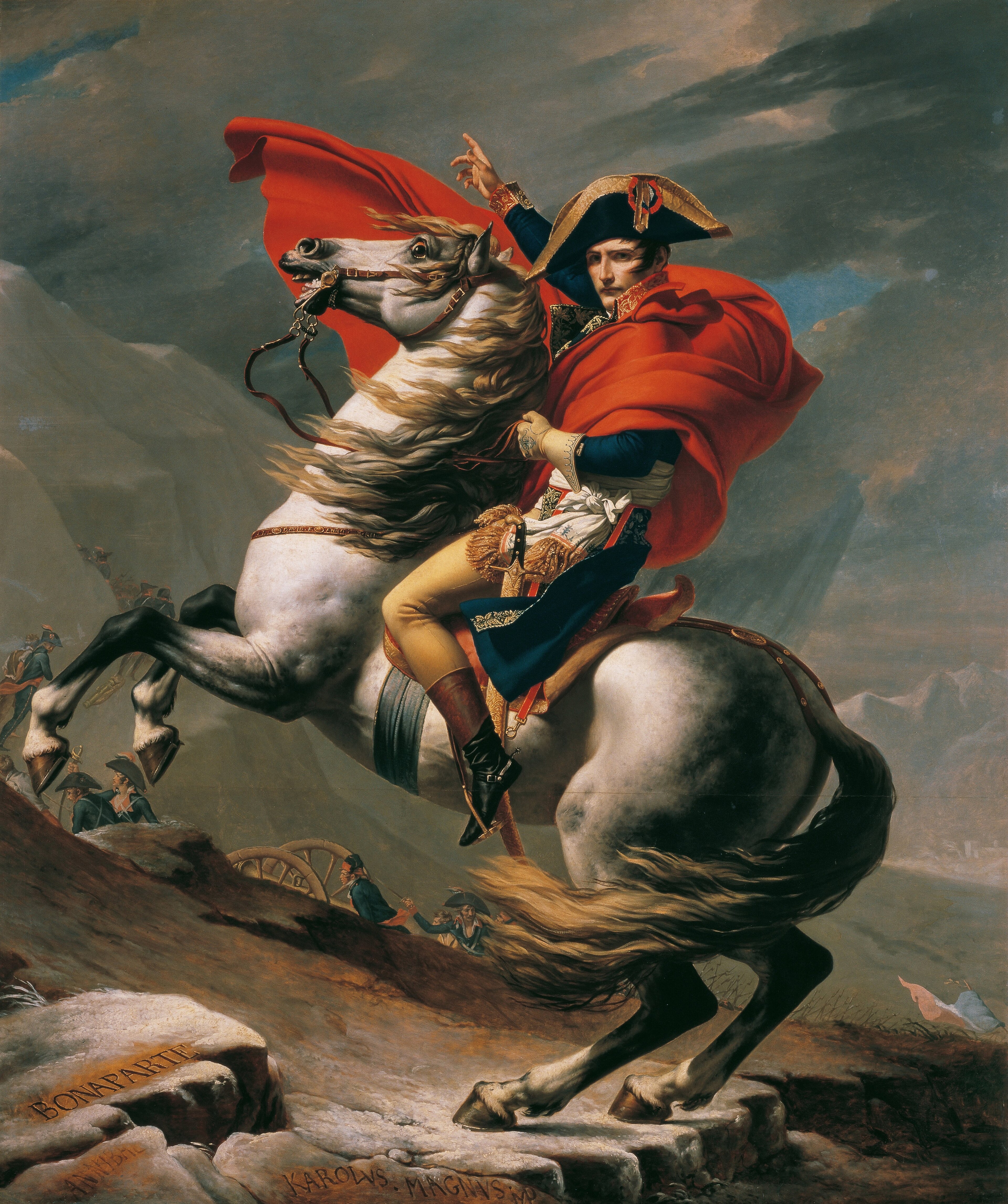 Napoleon gestures upward from a rearing pale horse amid windblown cloak and mountain rocks in Jacques-Louis David's 1801 canvas.