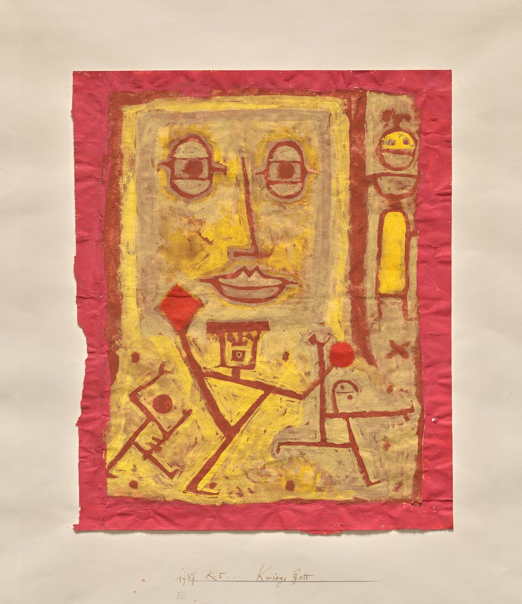 Klee's God of War, with a painted face and smaller figures over a printed newspaper sheet
