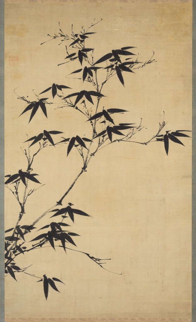 A Korean hanging scroll shows bamboo stems and leaves in tapered black ink strokes against open silk.