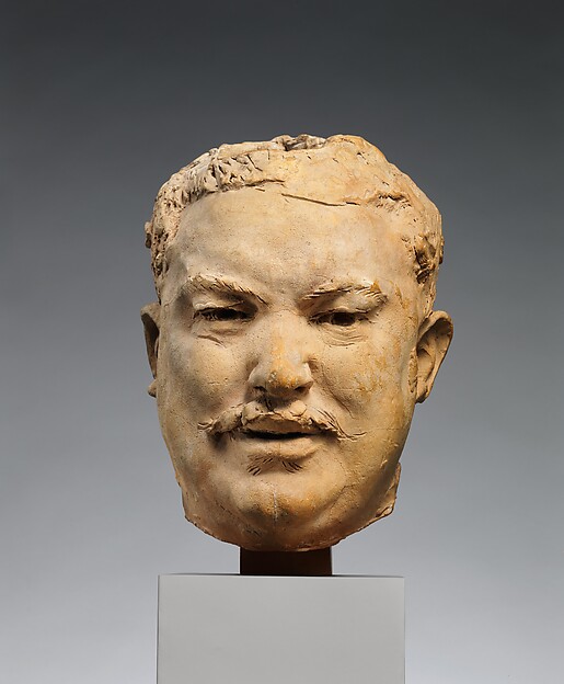 Terracotta bust study of Honoré de Balzac with rough modelled hair and shoulders.
